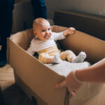 cost to hire movers for entire home. baby in moving box
