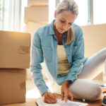 woman going through Checklist preparing for moving day